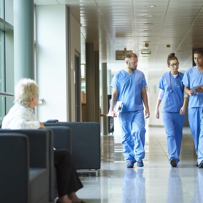 Group of trainee doctors in corridor