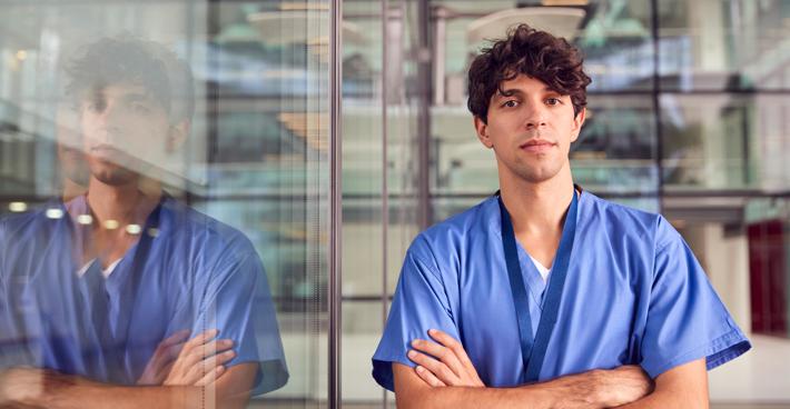 Junior doctor with arms folded