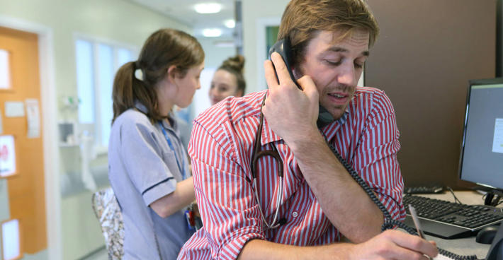 Junior doctor on phone