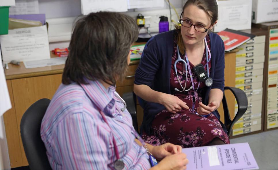 Female consultant with colleague